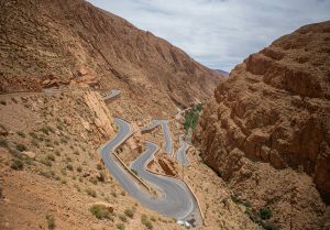 A winding road in the middle of a desert